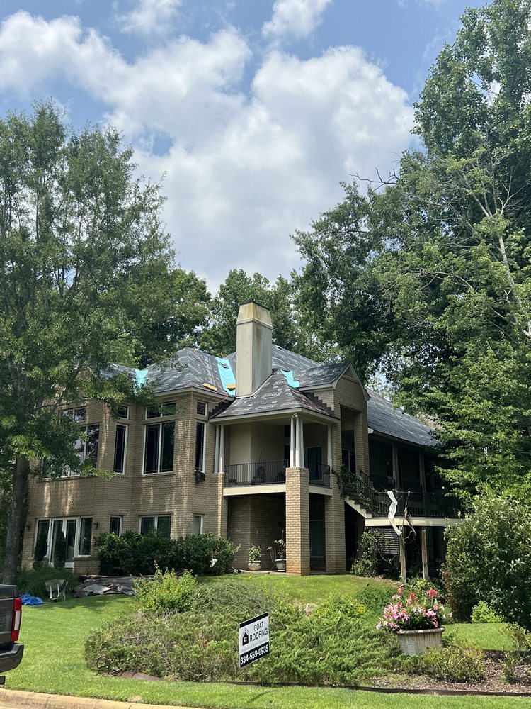 Slide of Goat Roofing