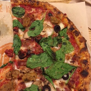 Blaze Pizza - custom pie - red sauce with sausage, olives, and spinach - Salad Near Me - Tallahassee, Florida Blaze Pizza - custom pie - red sauce with sausage, olives, and spinach - Salad Near Me - Tallahassee, Florida