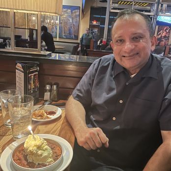 BJ's Restaurant & Brewhouse - Raj with a birthday Pizookie. - Pizza Near Me - Chino Hills, California BJ's Restaurant & Brewhouse - Raj with a birthday Pizookie. - Pizza Near Me - Chino Hills, California