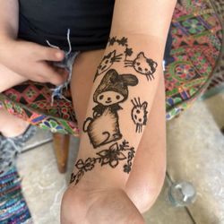 Henna Designs By Niki - Hello Kitty fanatic! Came out great!! She loves it.