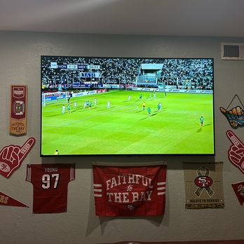 Fertech A/V & Security Solutions - 77" LG OLED in a faithful pool room with wires ran to an equipment closet - Security Systems Near Me Fertech A/V & Security Solutions - 77" LG OLED in a faithful pool room with wires ran to an equipment closet - Security Systems Near Me