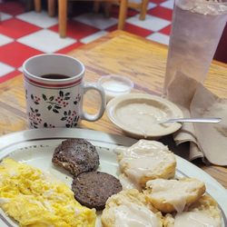 Uncle Petes Home Cooking - My breakfast two eggs soft scrambled two sausage patties no toast biscuits and gravy little extra gravy cawfee