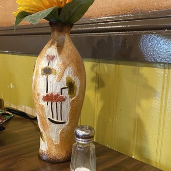 La Casa Adobe Restaurant - a vase with a sunflower in it - Mexican Near Me - Modesto, California La Casa Adobe Restaurant - a vase with a sunflower in it - Mexican Near Me - Modesto, California