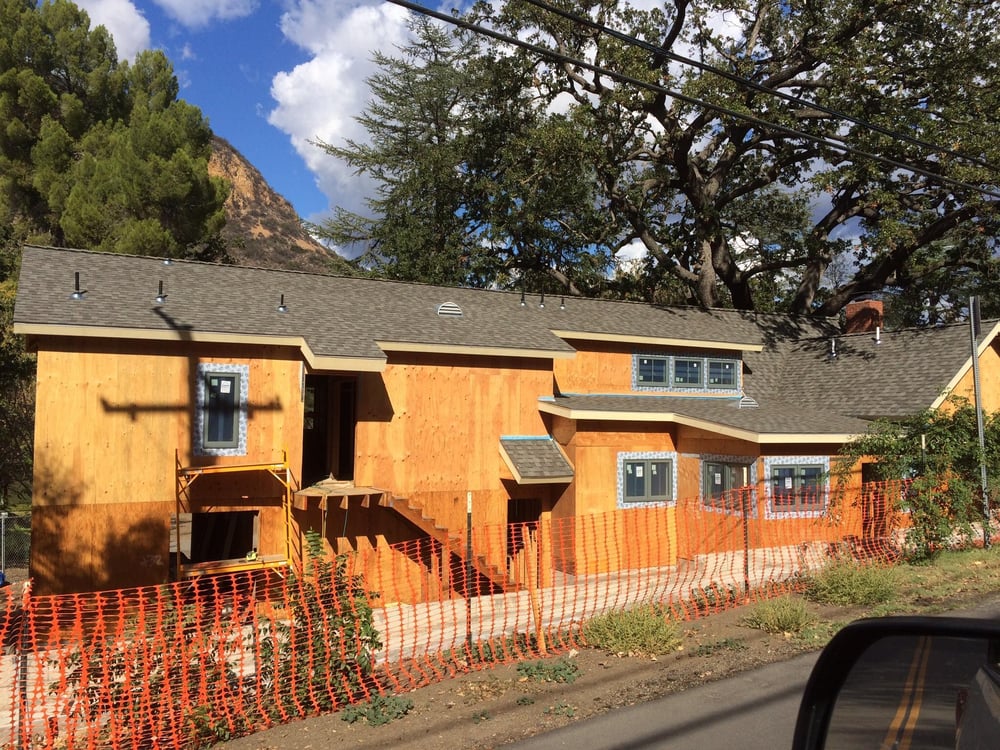 Slide of Wolfe Roofing Company