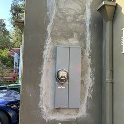 East West Electric - Service upgrade and stucco repair