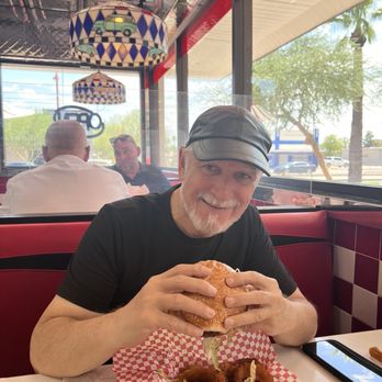 Lennys Burger - Joe enjoying Burger, onion rings & drink - Burgers Near Me - Phoenix, Arizona Lennys Burger - Joe enjoying Burger, onion rings & drink - Burgers Near Me - Phoenix, Arizona