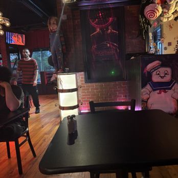 The Haunted House - Tables and chairs by ticket booth - New American Near Me - Cleveland Heights, Ohio