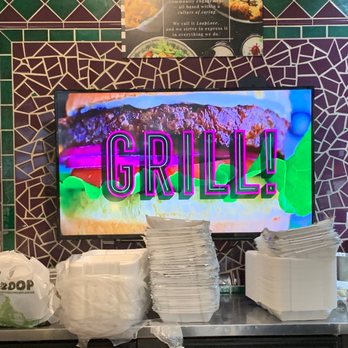 THE LOOP - Mandarin - Entry has a screen showing all the great options they have from pizza to burgers and shakes. - Pizza Near Me - Jacksonville, Florida