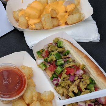 Dogtown Dogs - Tators and cheese with Elote, and buffalo tots with Angelino. Save your time; this photo is much more enjoyable than the real thing. Sorry. - Hot Dogs Near Me
