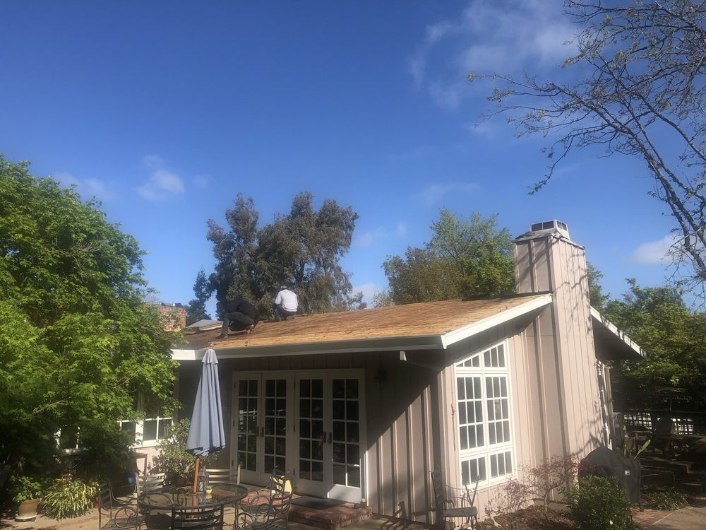 Slide of Tim Jones Roofing