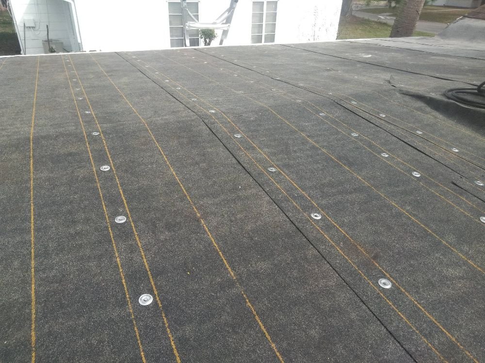 Slide of Saranovic & sons roofing