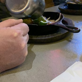 Phat Eatery - Sizzling beef pouring into the sizzling platter - Malaysian Near Me - Katy, Texas Phat Eatery - Sizzling beef pouring into the sizzling platter - Malaysian Near Me - Katy, Texas
