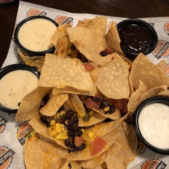 Bad Daddys Burger Bar - Chicken nachos with all the sauces on the side. They forgot the chicken but this was comped from our tab since they left out the protein - Burgers Near Me - Chamblee, Georgia Bad Daddys Burger Bar - Chicken nachos with all the sauces on the side. They forgot the chicken but this was comped from our tab since they left out the protein - Burgers Near Me - Chamblee, Georgia