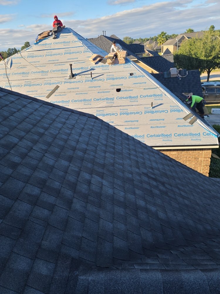 Slide of Reveille Roofing