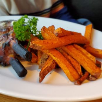 Doc B's Restaurant + Bar - Double-Cut Pork Chop with Sweet Potato Fries - New American Near Me - Fort Worth, Texas Doc B's Restaurant + Bar - Double-Cut Pork Chop with Sweet Potato Fries - New American Near Me - Fort Worth, Texas