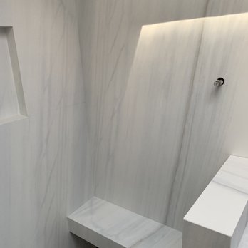 Marble European Style - Custom mitered pony wall and shower bench in porcelain. - Kitchen & Bath Near Me - Hayward, California Marble European Style - Custom mitered pony wall and shower bench in porcelain. - Kitchen & Bath Near Me - Hayward, California