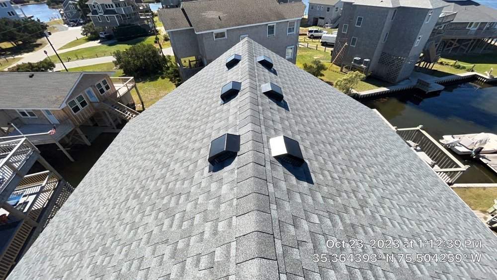 Slide of Patriots' Roofing