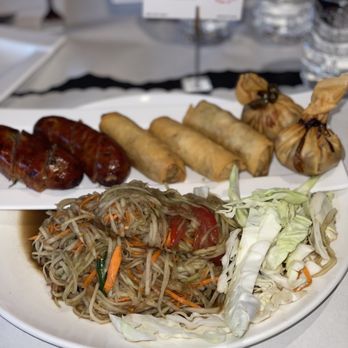 SL Kitchen - SLK sampler lao sausage, egg rolls, money bags and lao style papaya salad generous and delicious - Thai Near Me - San Leandro, California SL Kitchen - SLK sampler lao sausage, egg rolls, money bags and lao style papaya salad generous and delicious - Thai Near Me - San Leandro, California