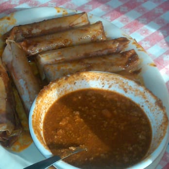 Doe's Eat Place - Tamales wrapped with wax paper and chili. - Steakhouses Near Me - Little Rock, Arkansas Doe's Eat Place - Tamales wrapped with wax paper and chili. - Steakhouses Near Me - Little Rock, Arkansas