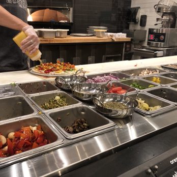 MOD Pizza - My pizza being topped - Pizza Near Me - Tempe, Arizona MOD Pizza - My pizza being topped - Pizza Near Me - Tempe, Arizona