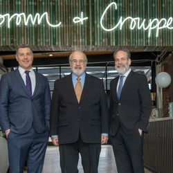 Brown & Crouppen: Injury and Car Accident Lawyers - Brown & Crouppen's founders standing in the lobby of their office.