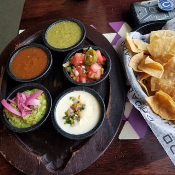 Condado Tacos - Dip trio with watermelon pico - Tacos Near Me - Indianapolis, Indiana Condado Tacos - Dip trio with watermelon pico - Tacos Near Me - Indianapolis, Indiana