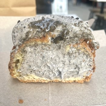 Bibble & Sip - Cross section of black sesame walnut cream puff - Coffee & Tea Near Me - New York, New York Bibble & Sip - Cross section of black sesame walnut cream puff - Coffee & Tea Near Me - New York, New York