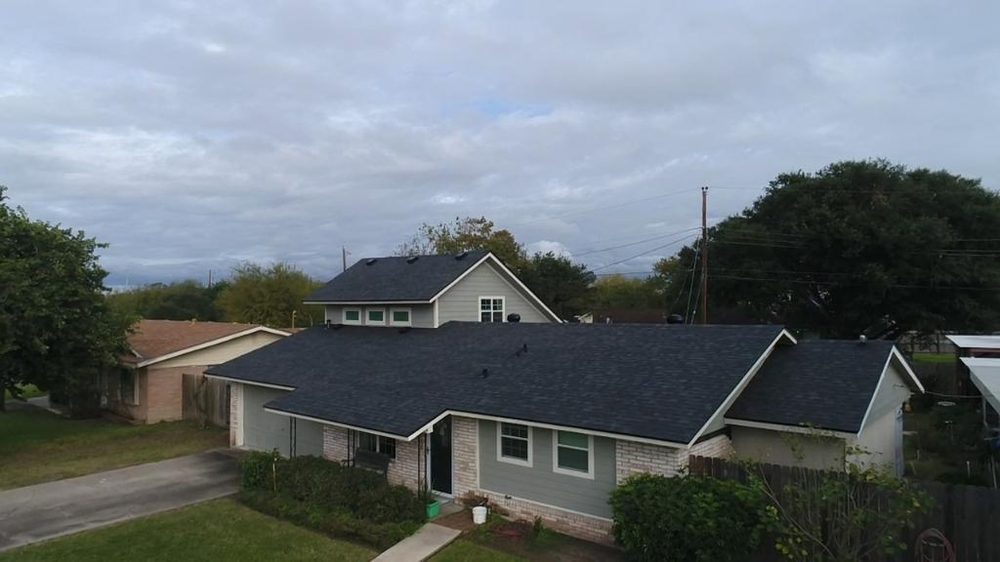 Slide of Vasquez Roofing Company