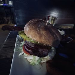 Rooney's Food and Spirits - Bacon cheeseburgers with onion rings and tartar sauce delicious