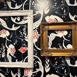 Swaylo’s Tiki Restaurant and Bar - Wall in the women's bathroom: mermaids