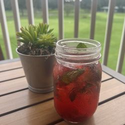 JC's Restaurant - Specialty cocktail with berries