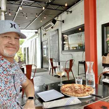 Buona Forchetta - Side patio with Nicola pizza, a glass of Rose´, and great service from the staff! - Pizza Near Me - Encinitas, California