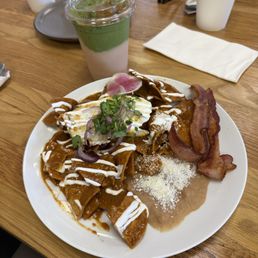 Chipotle Chilaquiles and strawberry Matcha Horchata. Chipotle Chilaquiles and strawberry Matcha Horchata.