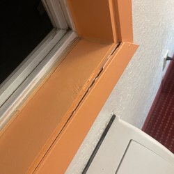American Inn & Suites - broke window trim