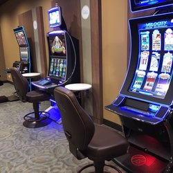 Game room with 5 Slot and video poker machines.