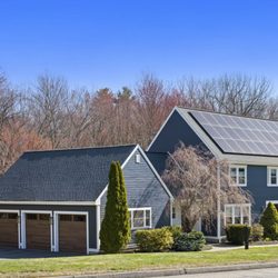Core Remodeling Services - CORE Westborough MA siding project with James Hardie Deep Ocean and four-season sunroom