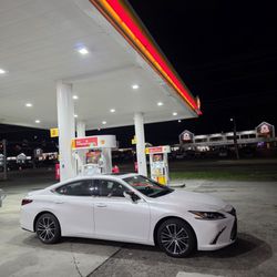 Shell - My pearl white Lexus ES 350 Luxury Edition parked next to the gas pump #3 at this Shell Service Station.