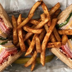 Primo's Grill & Deli - Club sandwich on wheat with seasoned fries. Yumm!