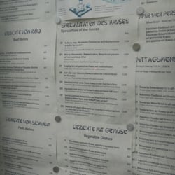 Kim Quy - Part of the menu outside the restaurant