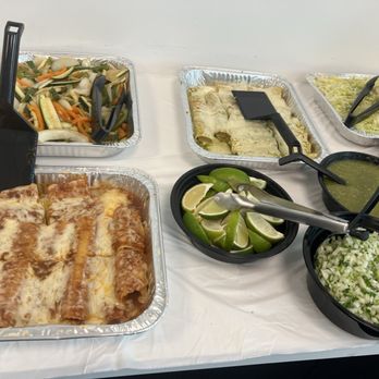 Tacos & Co - Enchiladas, one with red sauce and the other with one is green. - Mexican Near Me - Irvine, California Tacos & Co - Enchiladas, one with red sauce and the other with one is green. - Mexican Near Me - Irvine, California