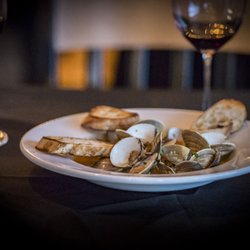 Longliner Lodge Restaurant - Clams, Spanish Chorizo, Tomato, Garlic, Beer, and Toast Points.