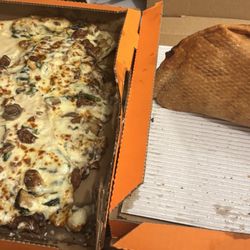 Cottage Inn Pizza - Slid pizza, uncut pizza
