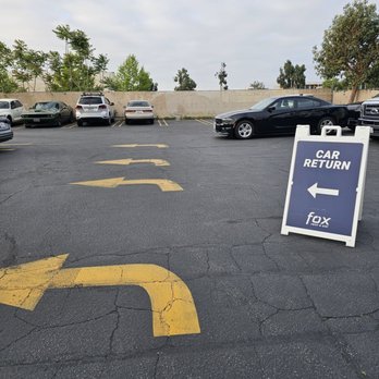 Fox Rent A Car - Look for this sign when returning the vehicle - Car Rental Near Me - Ontario, California Fox Rent A Car - Look for this sign when returning the vehicle - Car Rental Near Me - Ontario, California