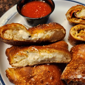 Dino's Pizza Kitchen - Inside cheese calzone. Red sauce is pretty good - Pizza Near Me - Livermore, California