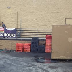 Wendy's - Bread crates near leaking trash bin