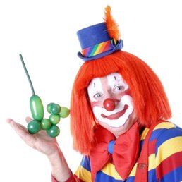 The owner/bouncer out front on his high horse trying to explain an enforced dress-code while in clown attire...goodbye!