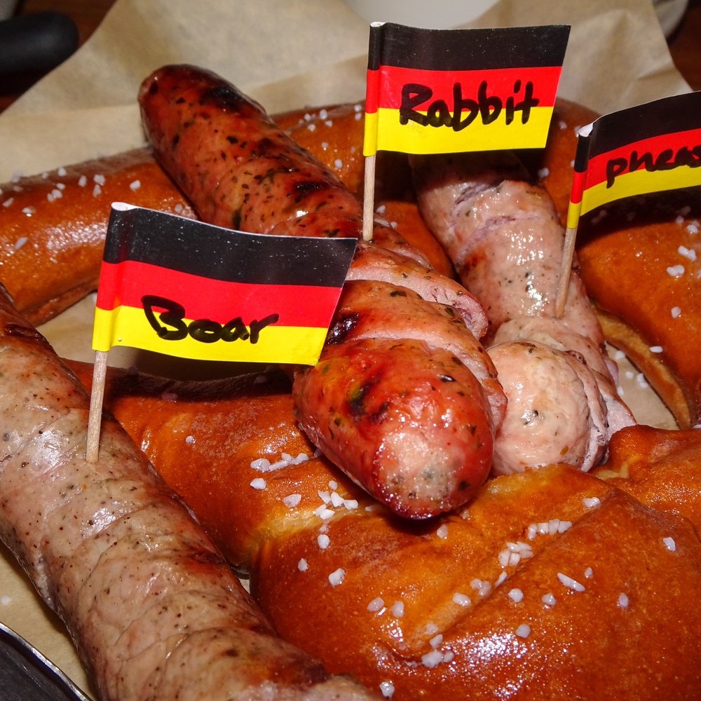 Würst Bier Hall - Giant pretzel with exotic sausages - German Near Me - Fargo, North Dakota Würst Bier Hall - Giant pretzel with exotic sausages - German Near Me - Fargo, North Dakota