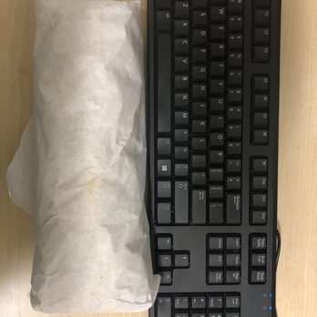 Cali Tacos - This is the size of the Angel burrito in comparison to my keyboard! - Mexican Near Me - Orange, California