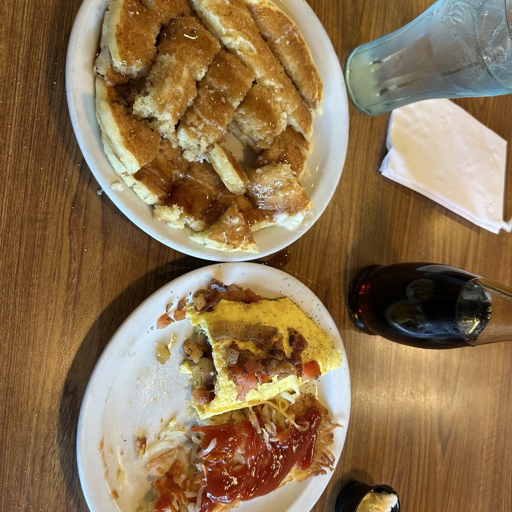 Bacon egg and cheese with tomato senior omelette hashbrowns and pancakes