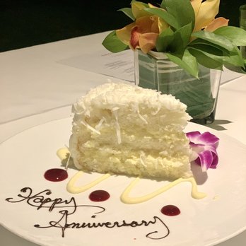 Orchids - Coconut cake (complimentary, for our anniversary) - Breakfast & Brunch Near Me - Honolulu, Hawaii